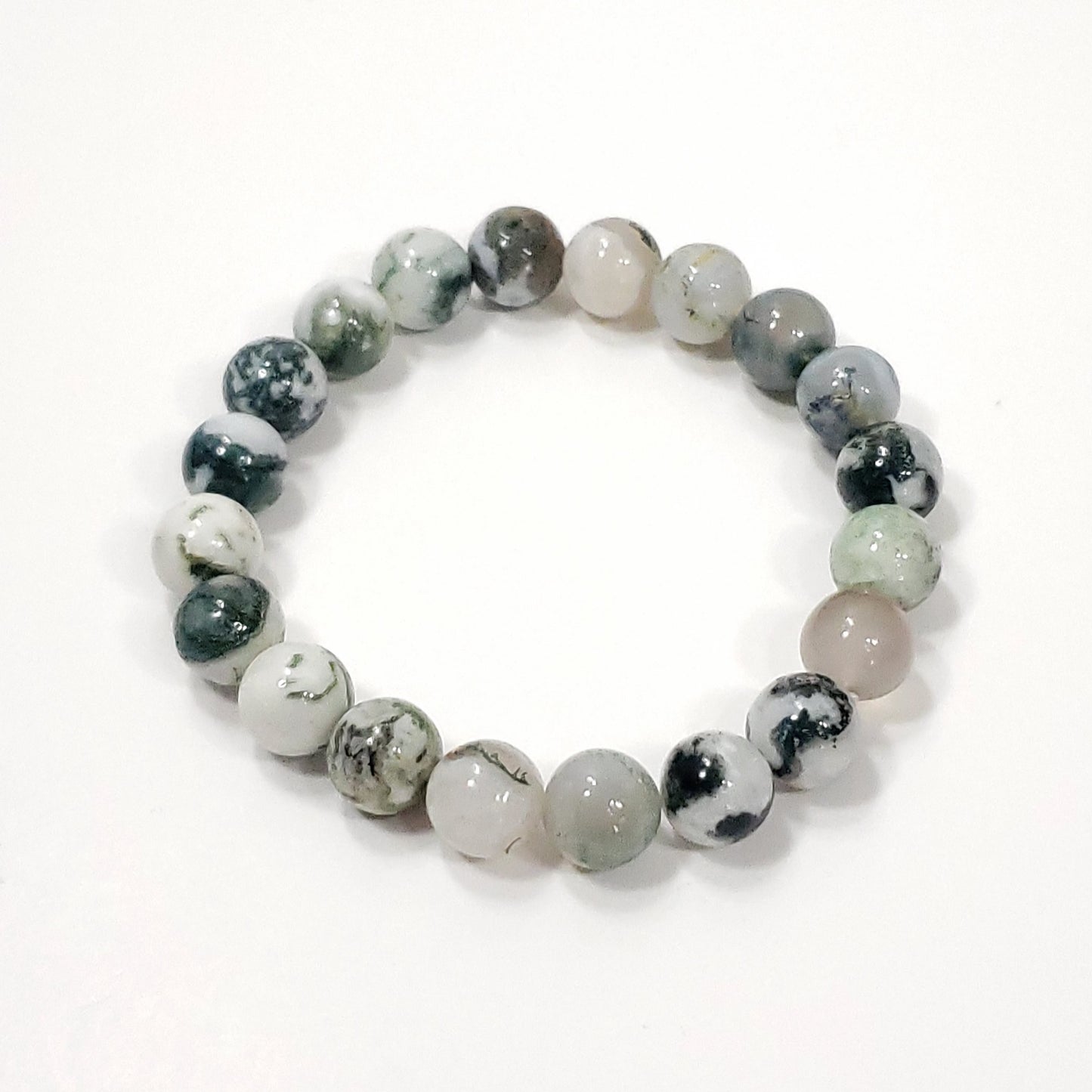 Green Moss Agtate Crystsal Round beaded bracelet with gray and white stones on a white background