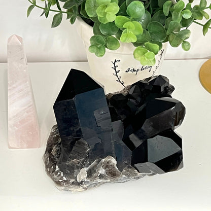 Natural Smoky Quartz cluster on display for home décor and protective crystal energy