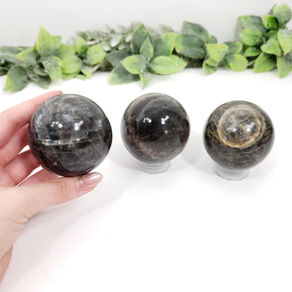 Elegant Black Moonstone Sphere for Psychic Protection and Divine Feminine Energy