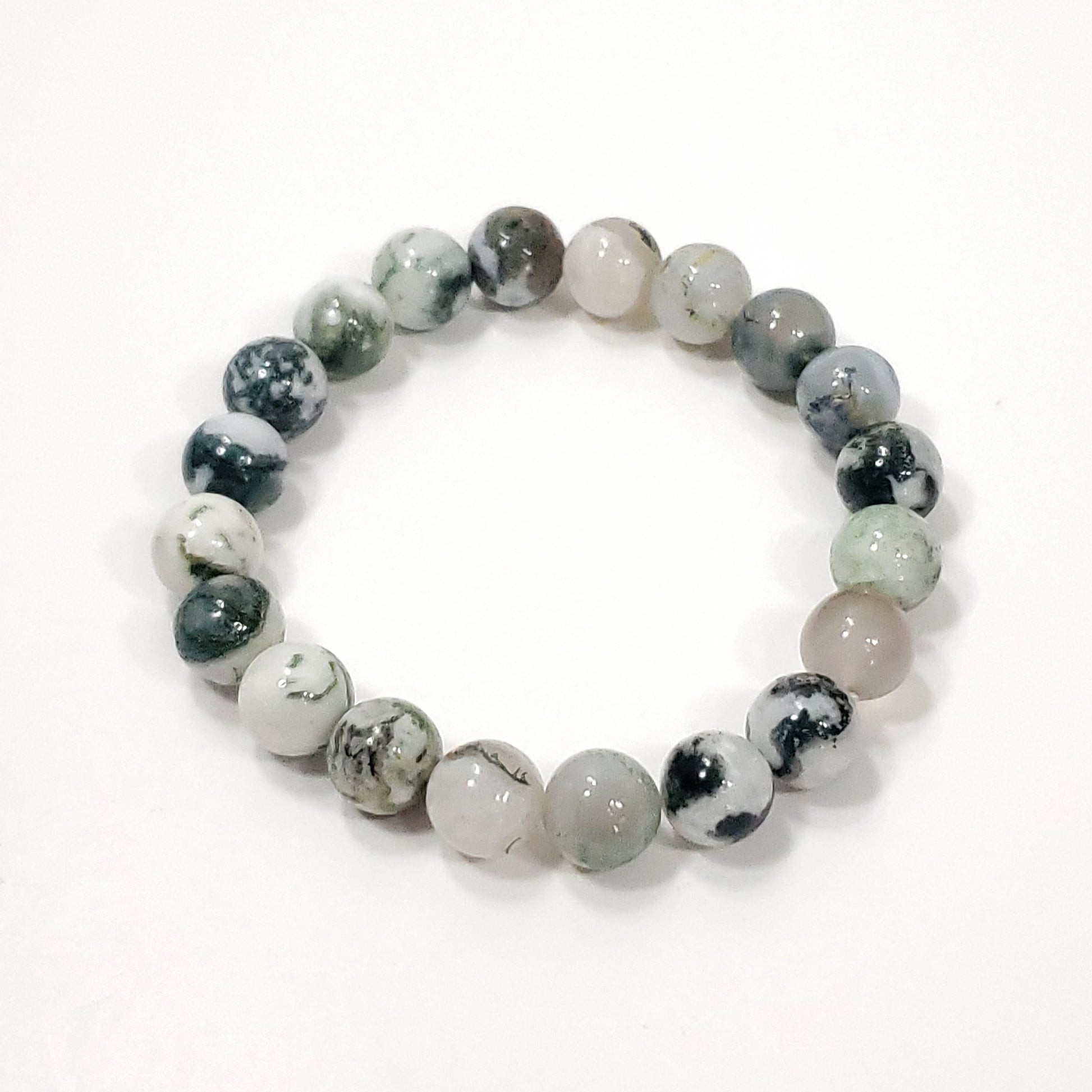 Green Moss Agtate Crystsal  Round beaded bracelet with gray and white stones on a white background