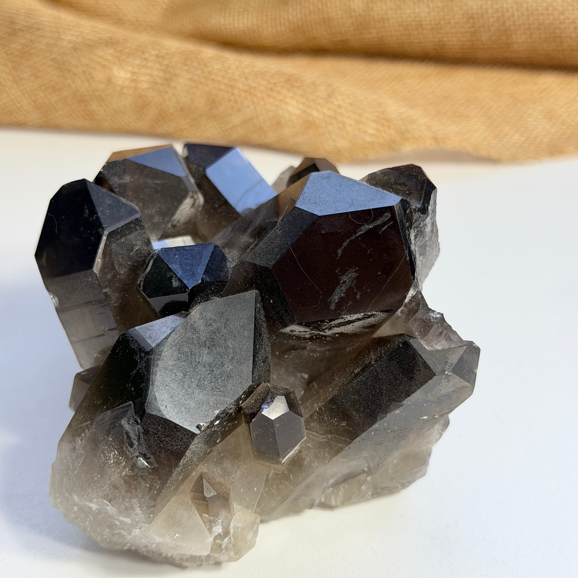 Mineral crystal cluster on a white background