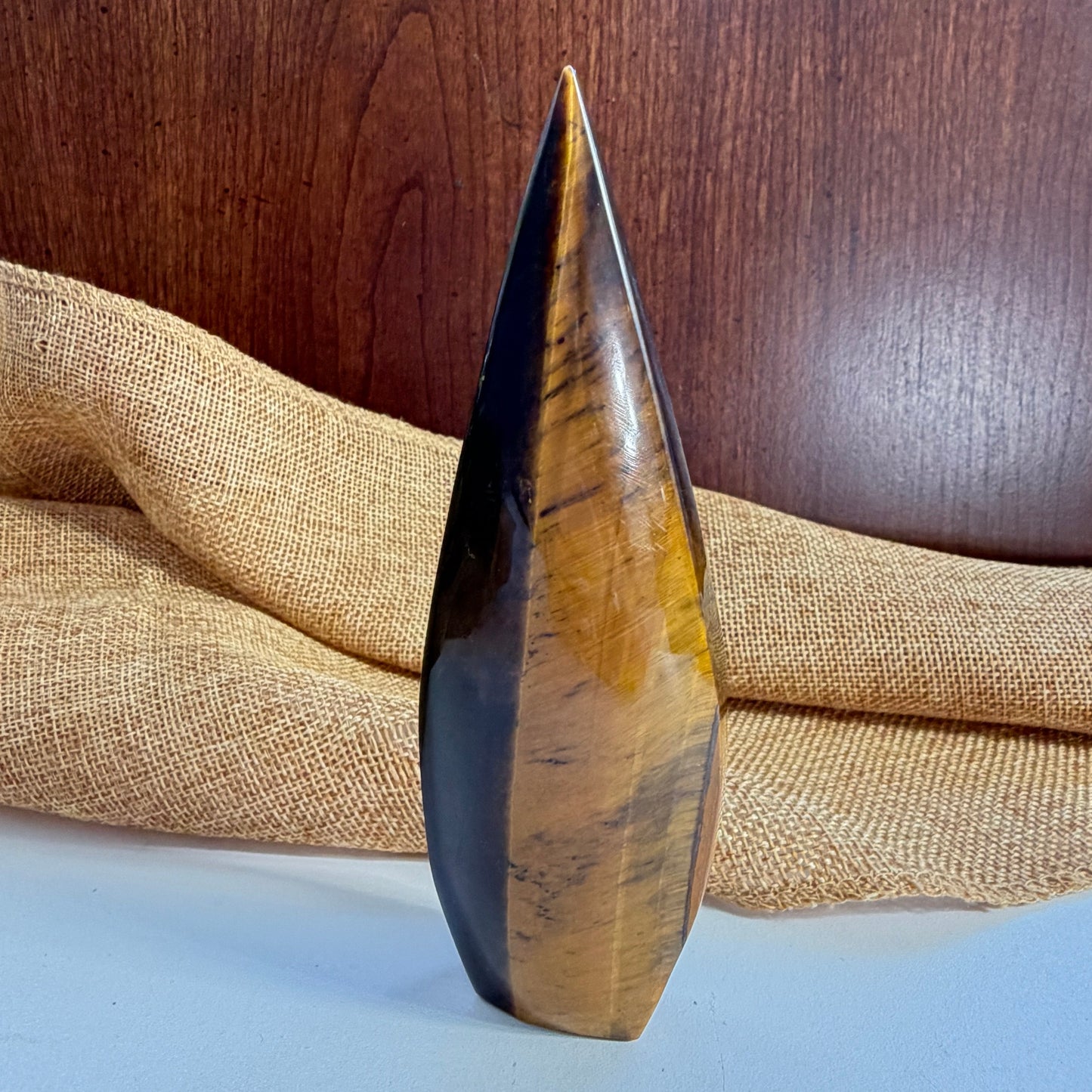 Tiger Eye Flame crystal alternate angle showcasing golden shimmer and grounding stone qualities