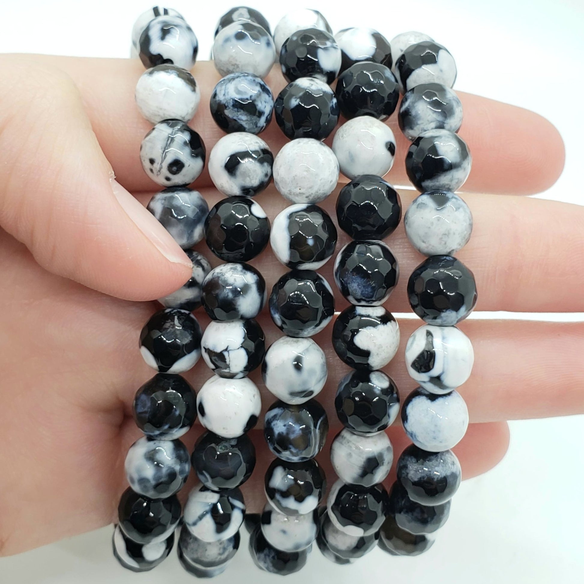 Orca Agate 8mm Faceted Beads: A Symphony of Serenity and Healing Our  exquisite collection of 8mm Faceted Beads, featuring a harmonious blend of  soothing blue, gray, and white hues, offers more than